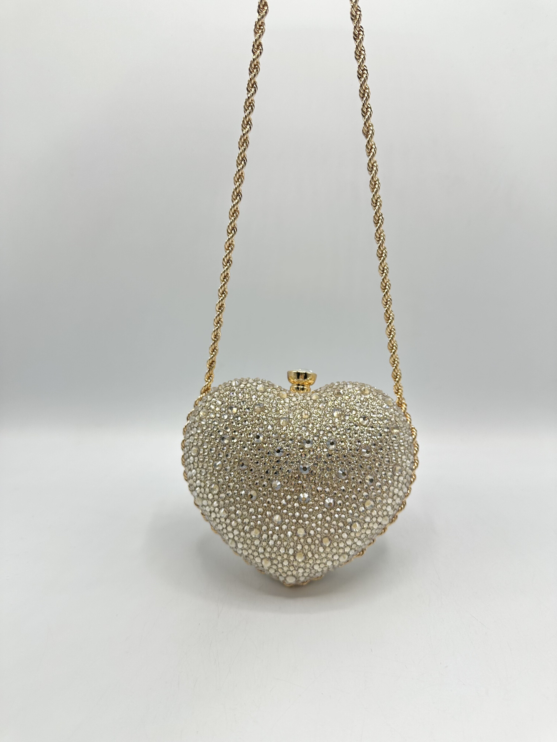 Wholesaler KL - Small heart-shaped evening bag with rhinestones