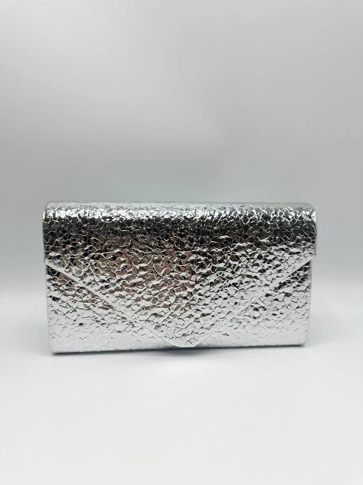 Mayorista KL - Clutch sobre metálico