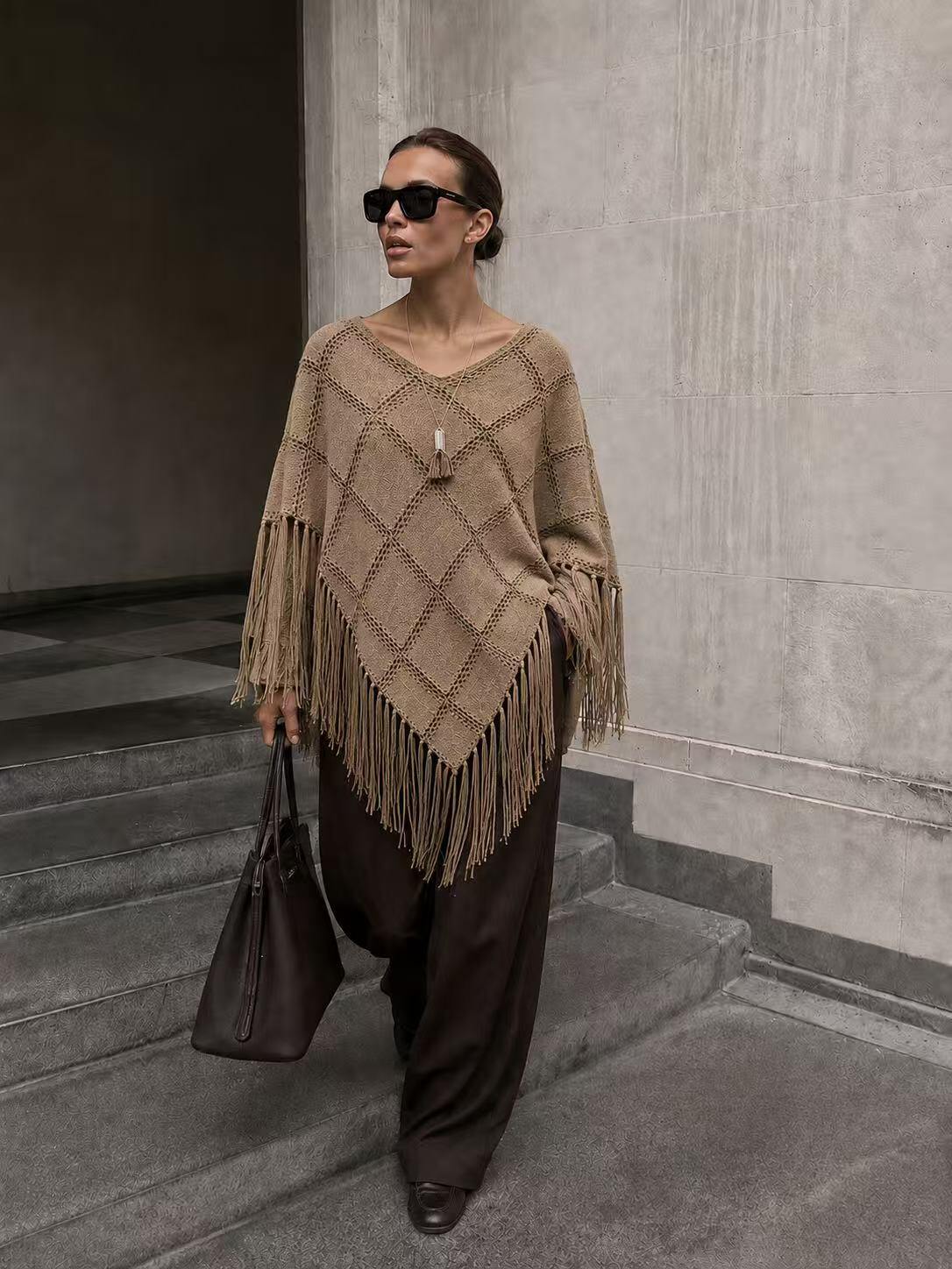 Wholesaler Kothè - Long women's poncho with fringes and cut-out details