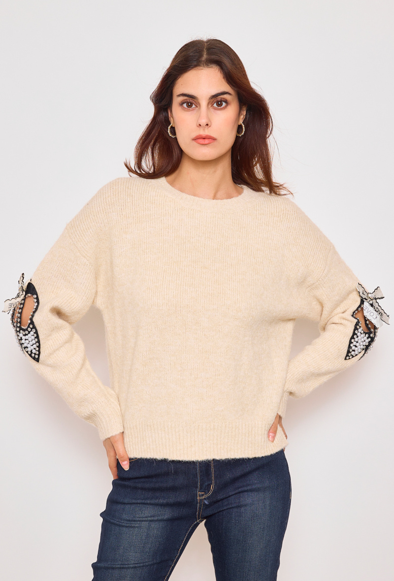 Grossista KY CREATION - Maglione con nastri e strass sulle maniche