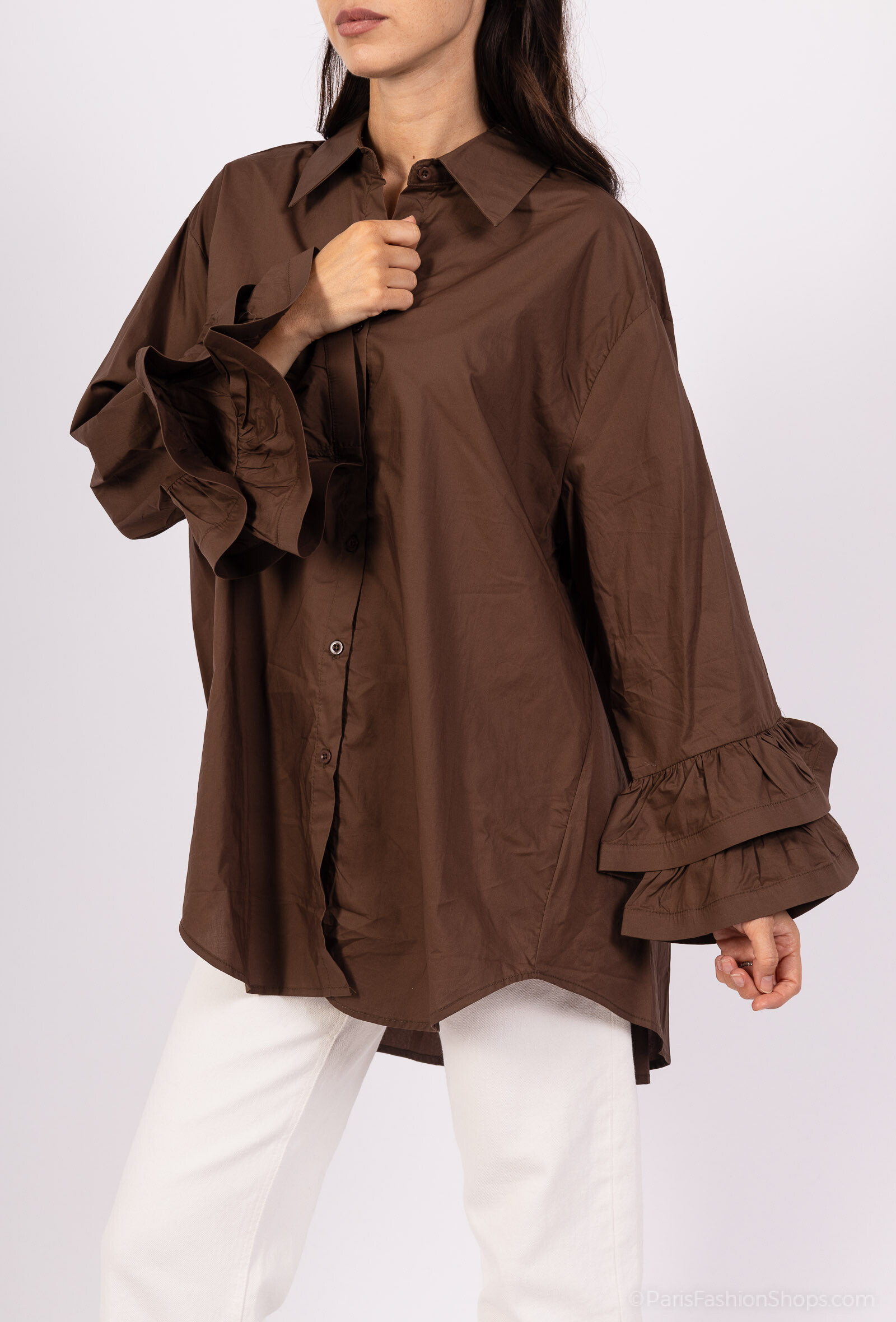 Add a touch of elegance and refinement to your wardrobe with this shirt. This loose shirt with a classic collar seduces with its fluid and modern cut. Featuring long puff sleeves with cuffs and a button closure along the entire length, it offers a casual and elegant look at the same time. The model is 177cm tall and wears the size S. S ⁄ M=36-40 M ⁄ L=40-44
