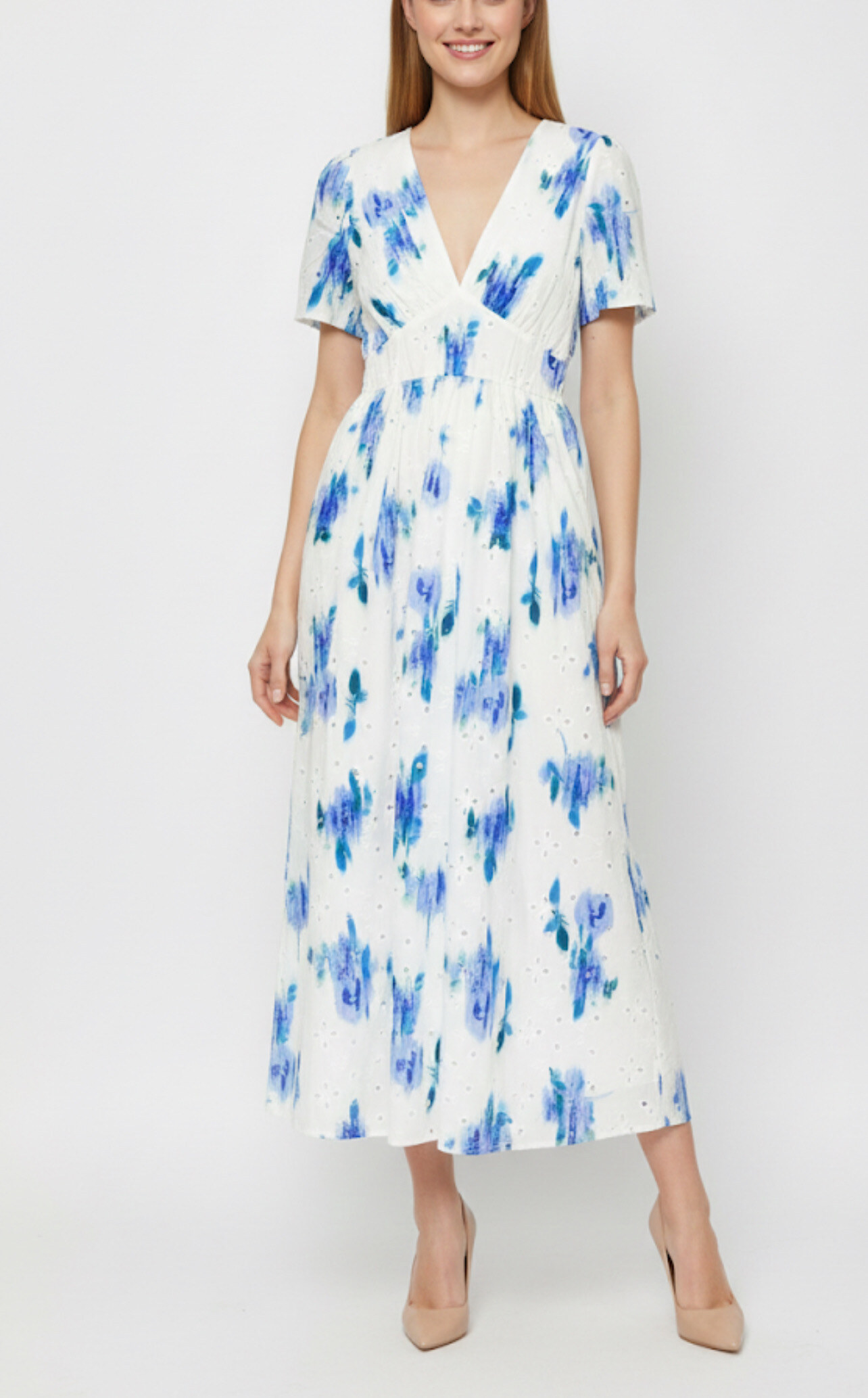 Long cotton dresses with delicate embroidery, perfect for spring/summer, made in China.