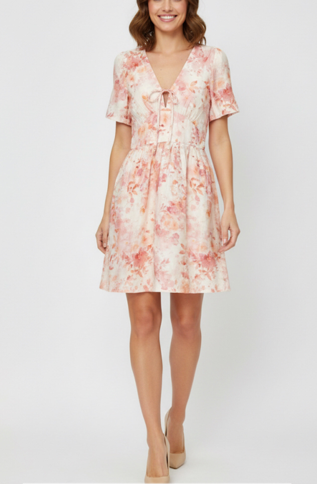 Elegant short dress in cotton (80%) and polyester (20%), perfect for spring/summer, made in China.