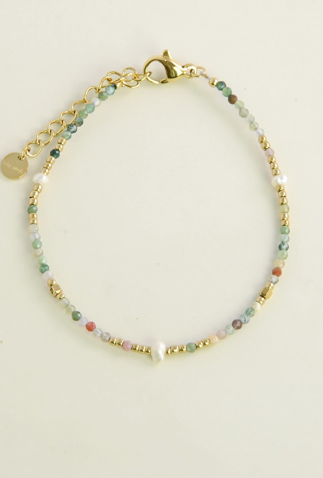 Grossiste LILY CONTI - Bracelet en acier inoxydable doré, pierres naturelles et perles d’eau douce