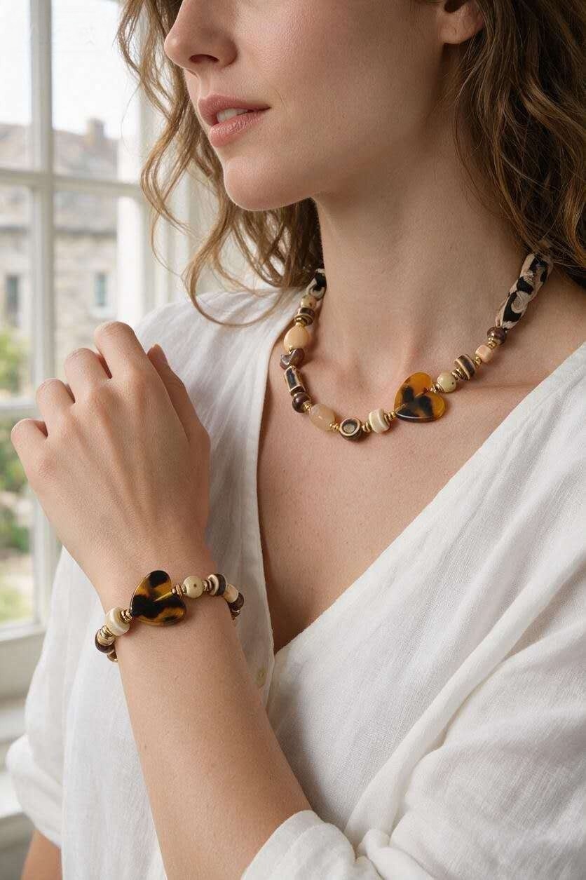 Grossiste LILY CONTI - Parure collier et bracelet en acier inoxydable doré avec résine et céramique