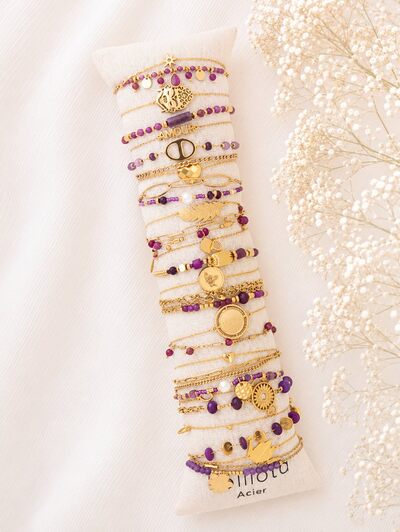 Grossista Lolilota - set di 24 braccialetti viola e dorati Grossista Lolilota - set di 24 braccialetti viola e dorati