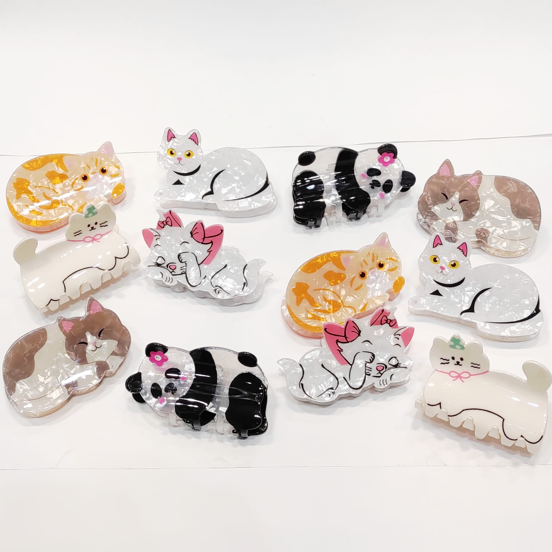 Grossiste Lolo & Yaya - Paquet de 12pcs pinces à cheveux chats, unité 2€50