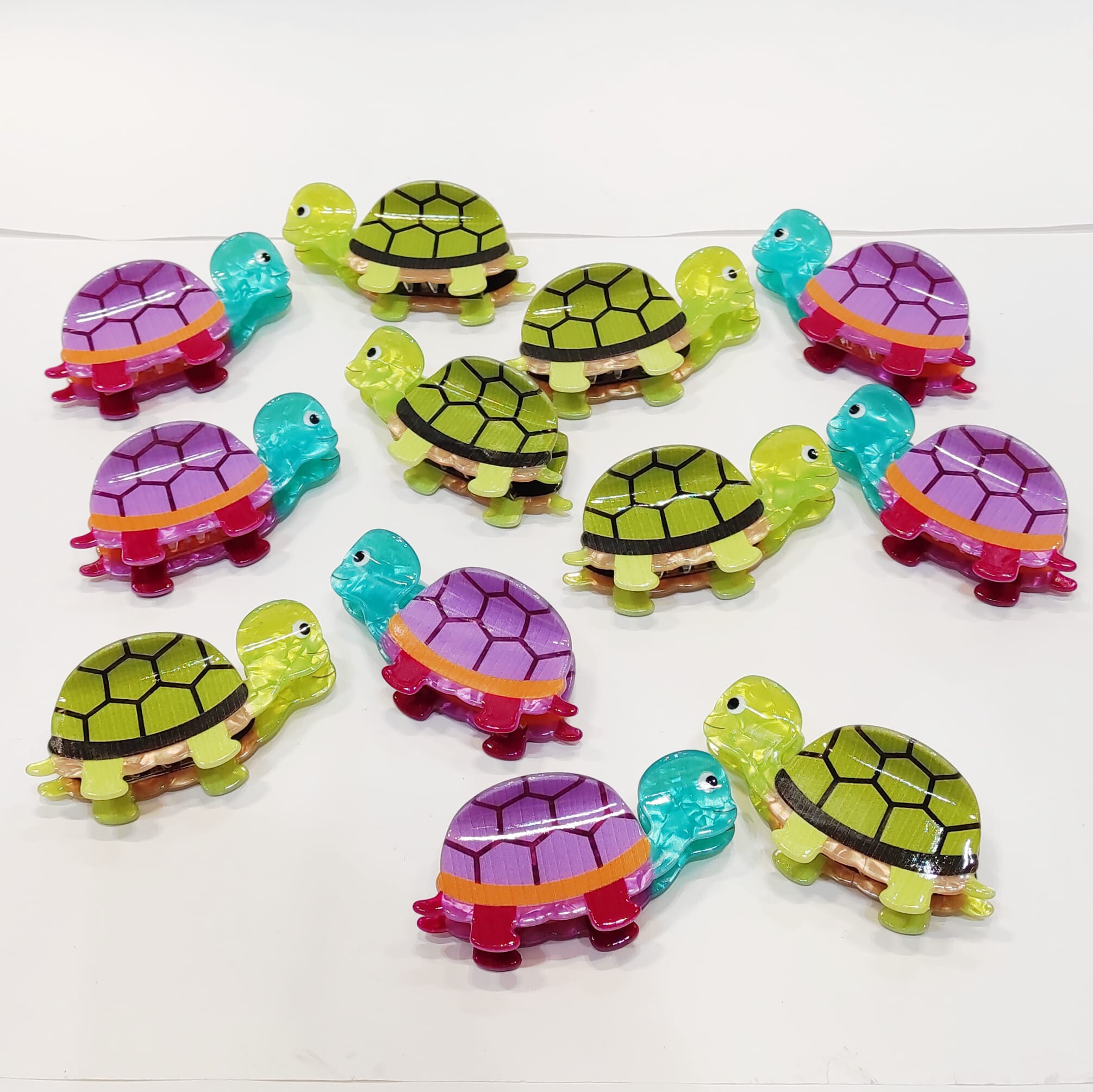 Grossiste Lolo & Yaya - Paquet de 12pcs pinces à cheveux tortue, unité 2€50