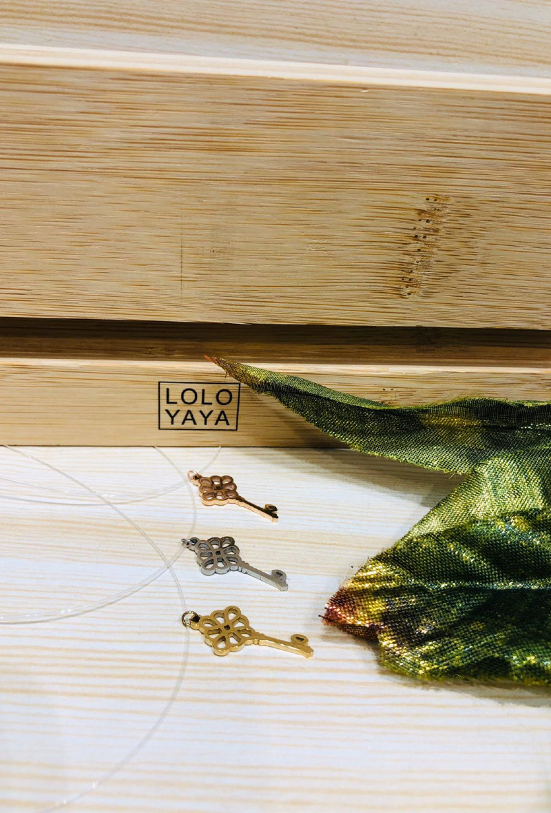 Grossiste LOLO & YAYA - Collier fil de pêche Clé en Acier inoxydable
