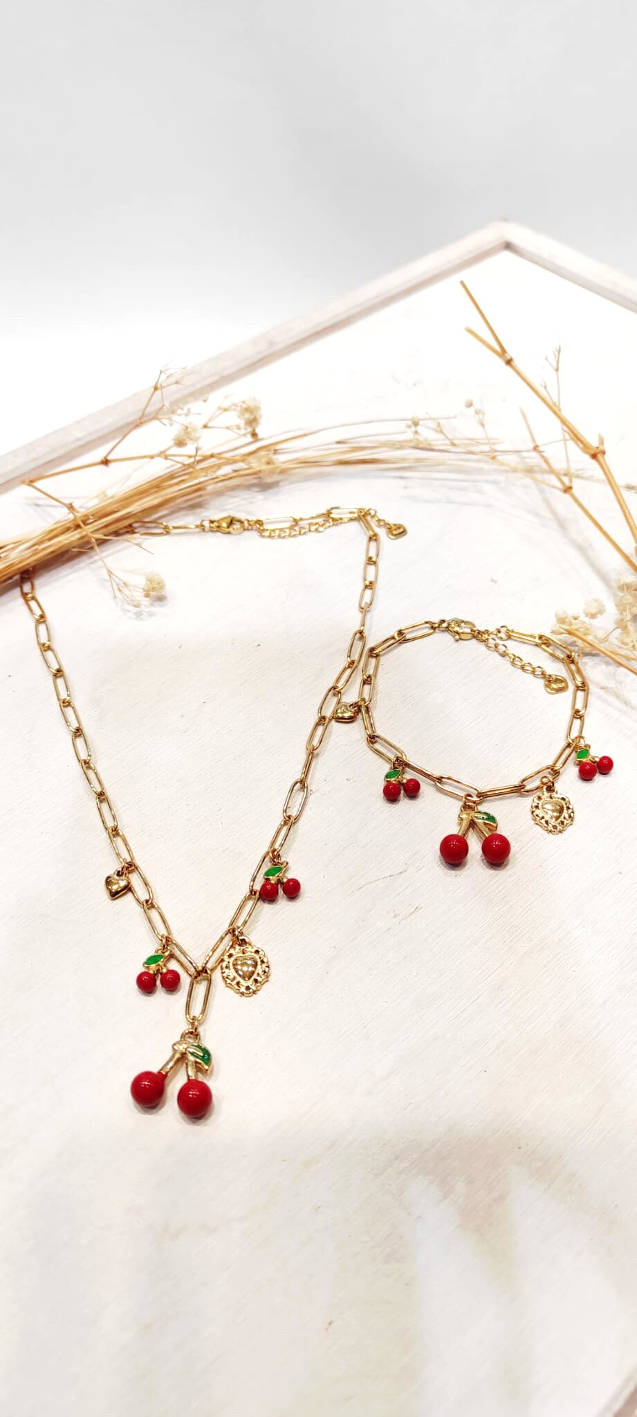 Wholesaler Lolo & Yaya - Grosse knit necklace with steel cherry cherry charm
