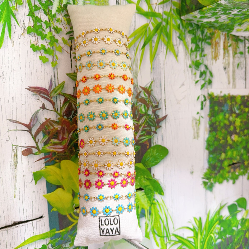 Großhändler Lolo & Yaya - Set mit 16 Gänseblümchen-Armbändern aus Stahl zur kostenlosen Präsentation