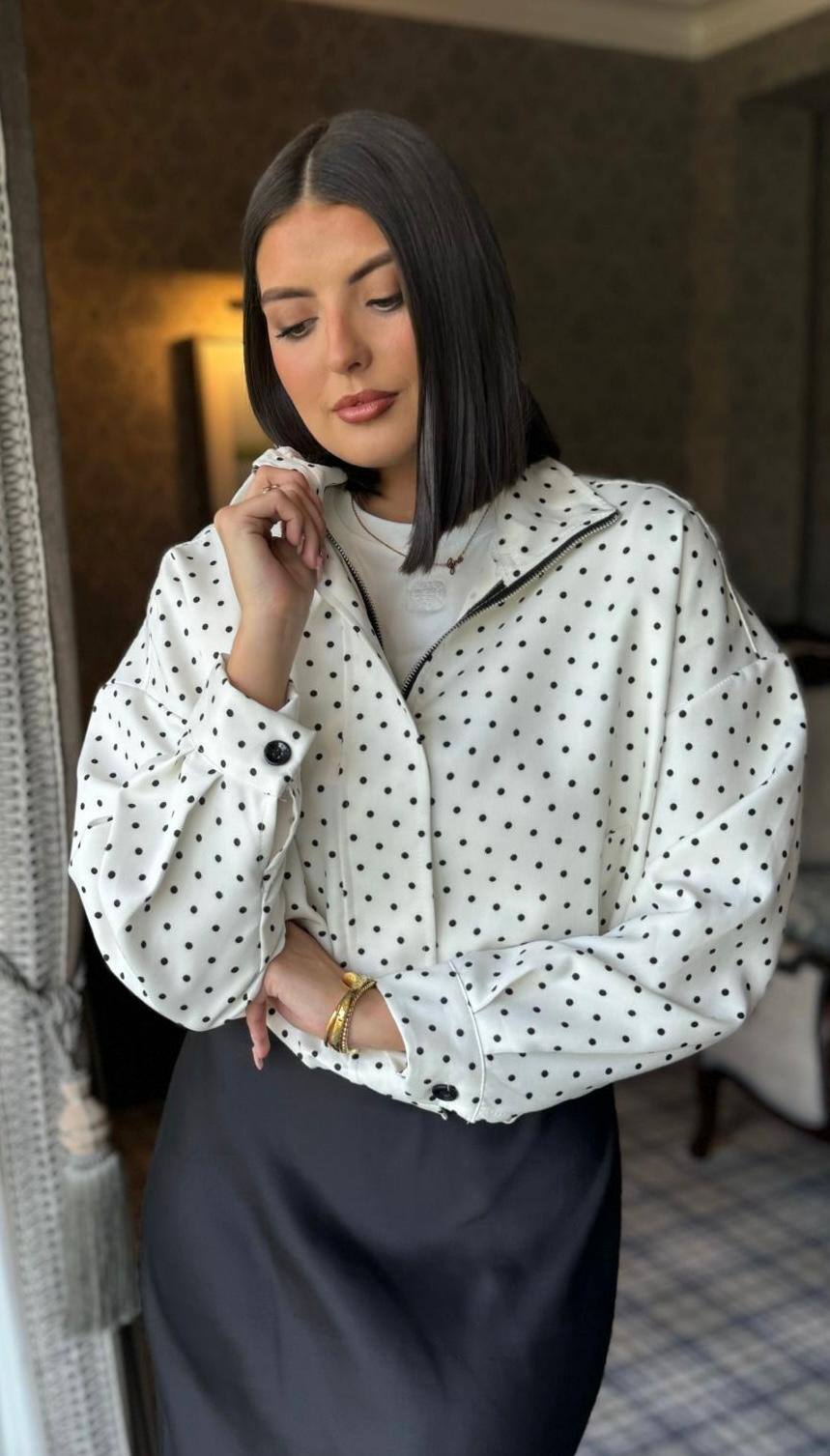 Grossista Loriane - Blusa con zip e motivo a pois