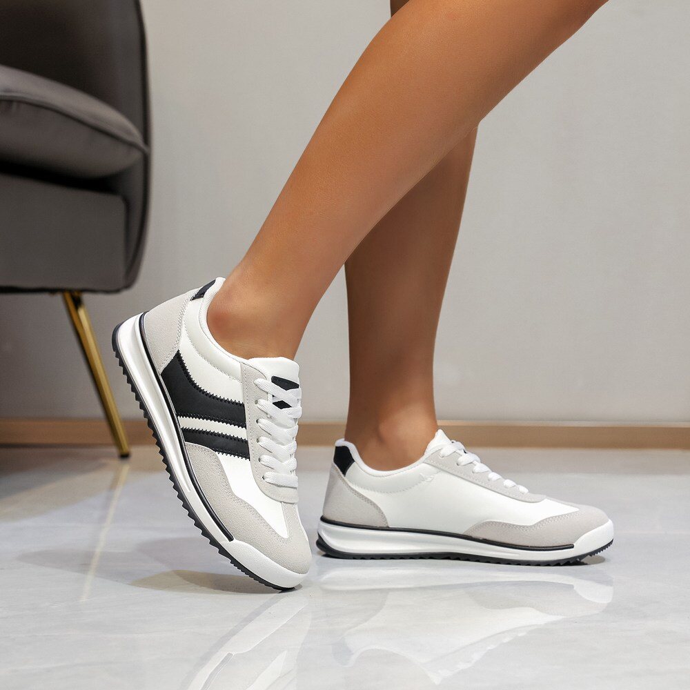 Großhändler LOV'IT - Zweifarbige Sneaker mit Streifen