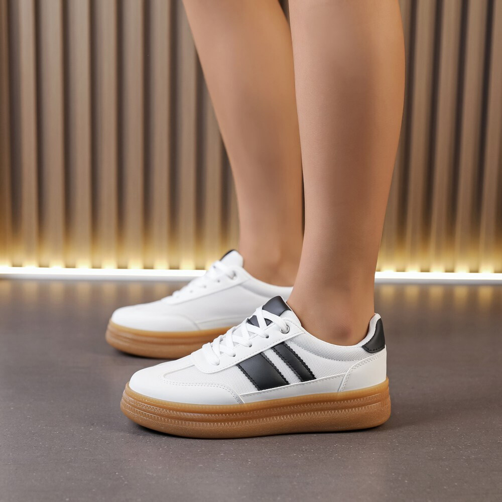Großhändler LOV'IT - Zweifarbige Sneaker mit Streifen