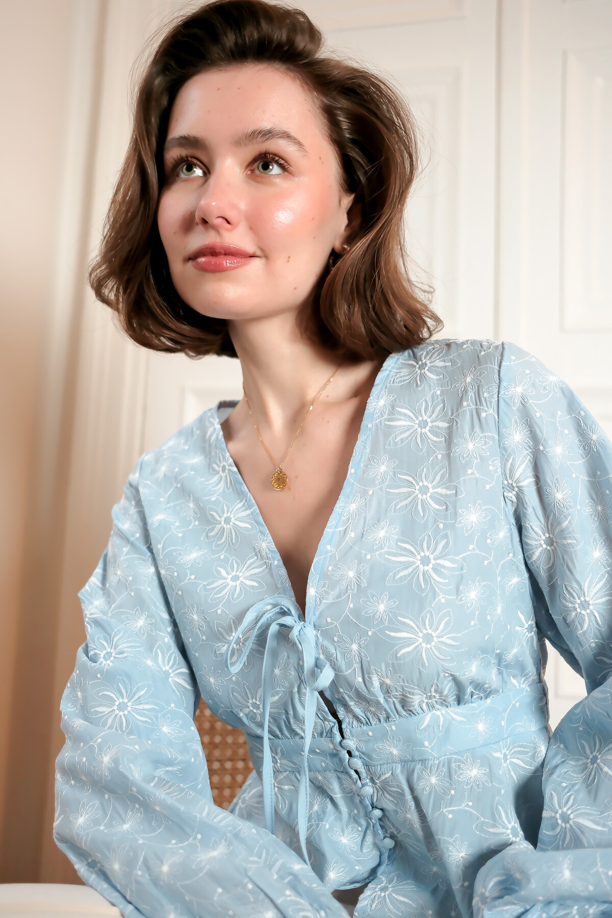 Wholesaler LOVIE & Co - LOVIE - Embroidered floral top with puff sleeves