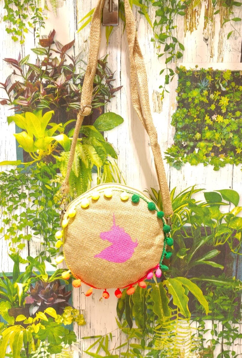 Wholesaler Loya Bijoux - Small round unicorn shoulder bag with jute pompom