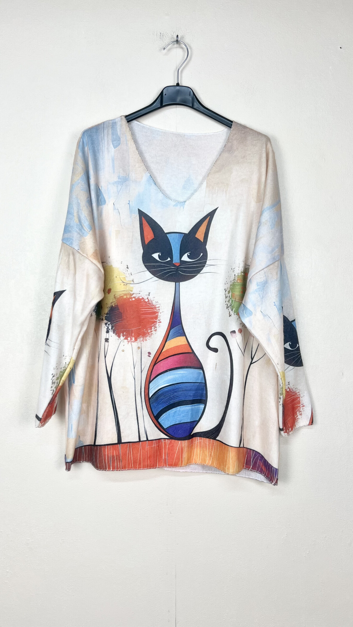 Grossista Lucky Nana - Maglione a righe con scollo a V e maniche lunghe.