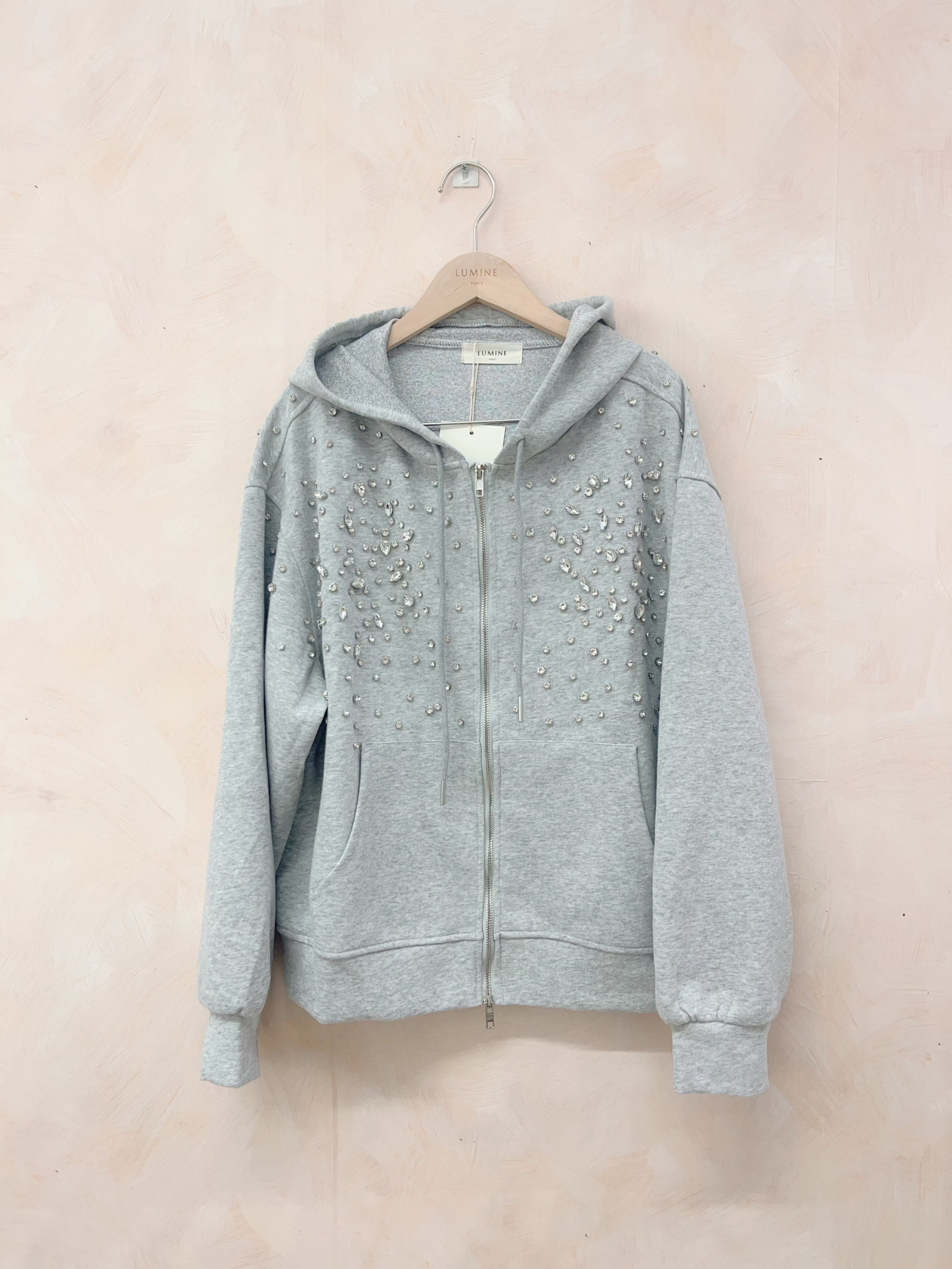 Grossiste LUMINE - Gilet capuche à strass