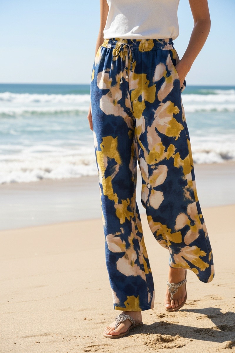 Großhändler Lusa Mode - Lässige, weit geschnittene Blumenhose mit Taschen und verstellbarem Kordelzug