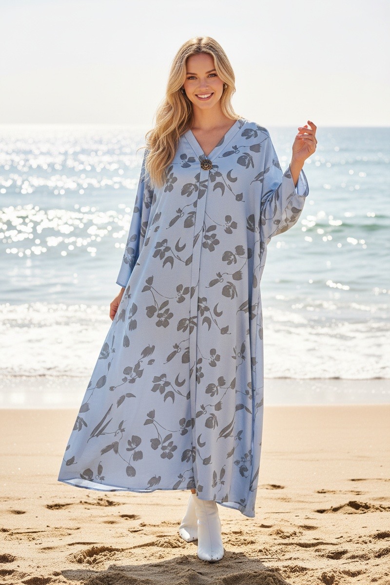 Mayorista Lusa Mode - Vestido largo y fluido con estampado floral y efecto de lentejuelas, con bolsillos, un cinturón y un broche.