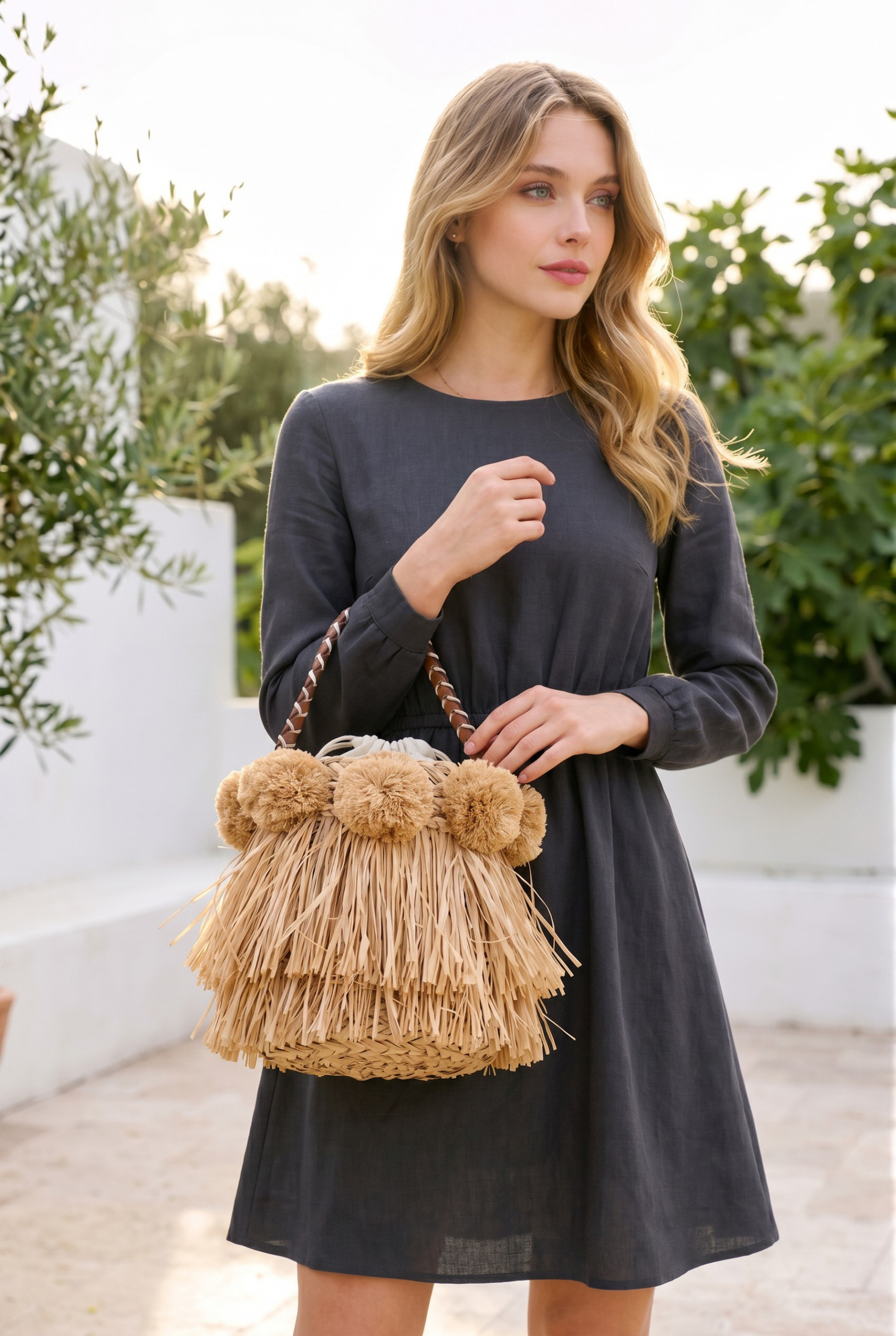 Wholesaler LUX - Bucket bag — raffia with pom-poms and layered fringes — braided handle — BOHO
