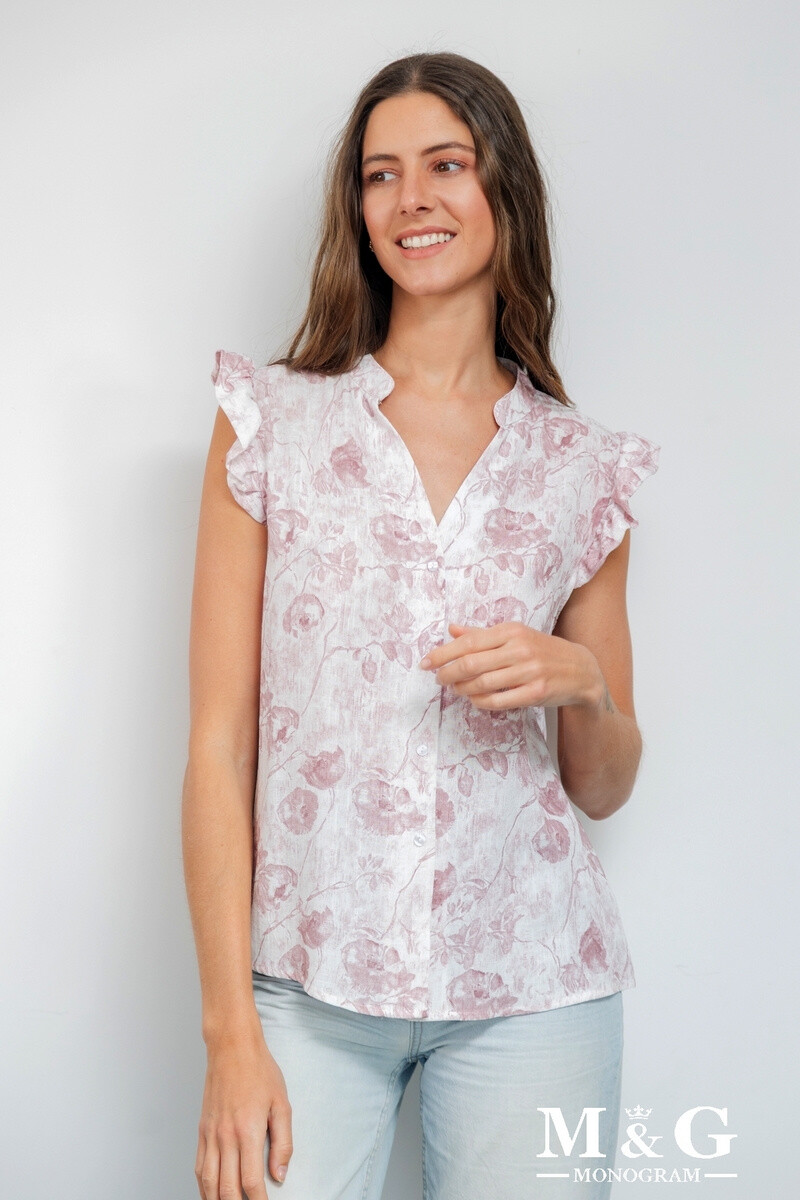 Flower -printed sleeveless shirt. The model measures 1.80m and wears of S. Length: 62cm
