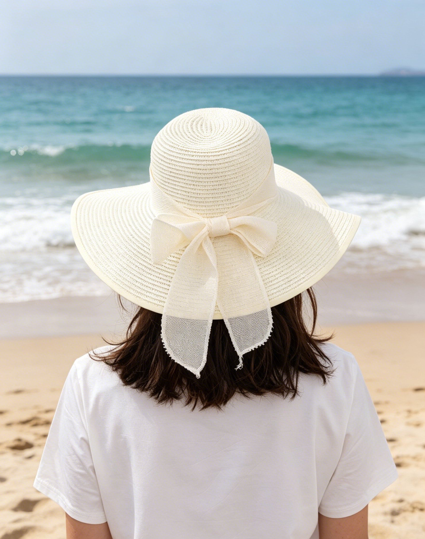 Grossiste M&P Accessoires - Chapeau grande visière imitation paille avec ruban nœud papillon