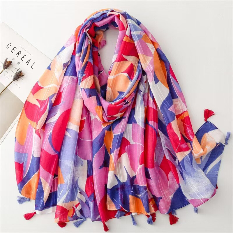 Mayorista M&P Accessoires - Pañuelo estampado de hojas con pompones