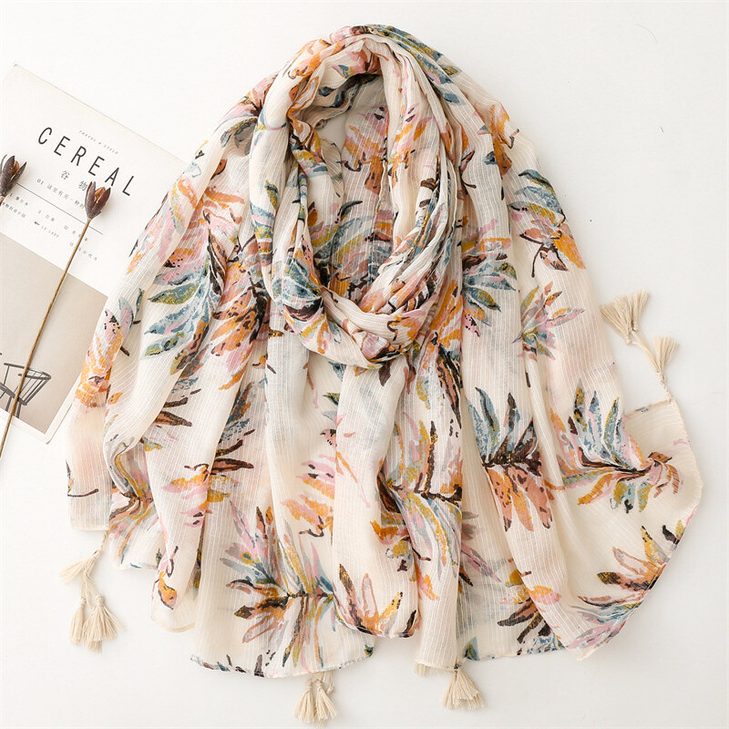 Mayorista M&P Accessoires - Pañuelo estampado de hojas con pompones