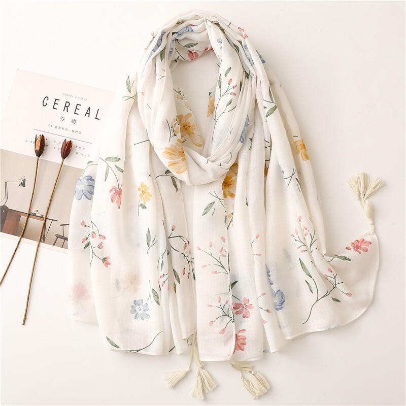 Mayorista M&P Accessoires - Pañuelo estampado de hojas con pompones