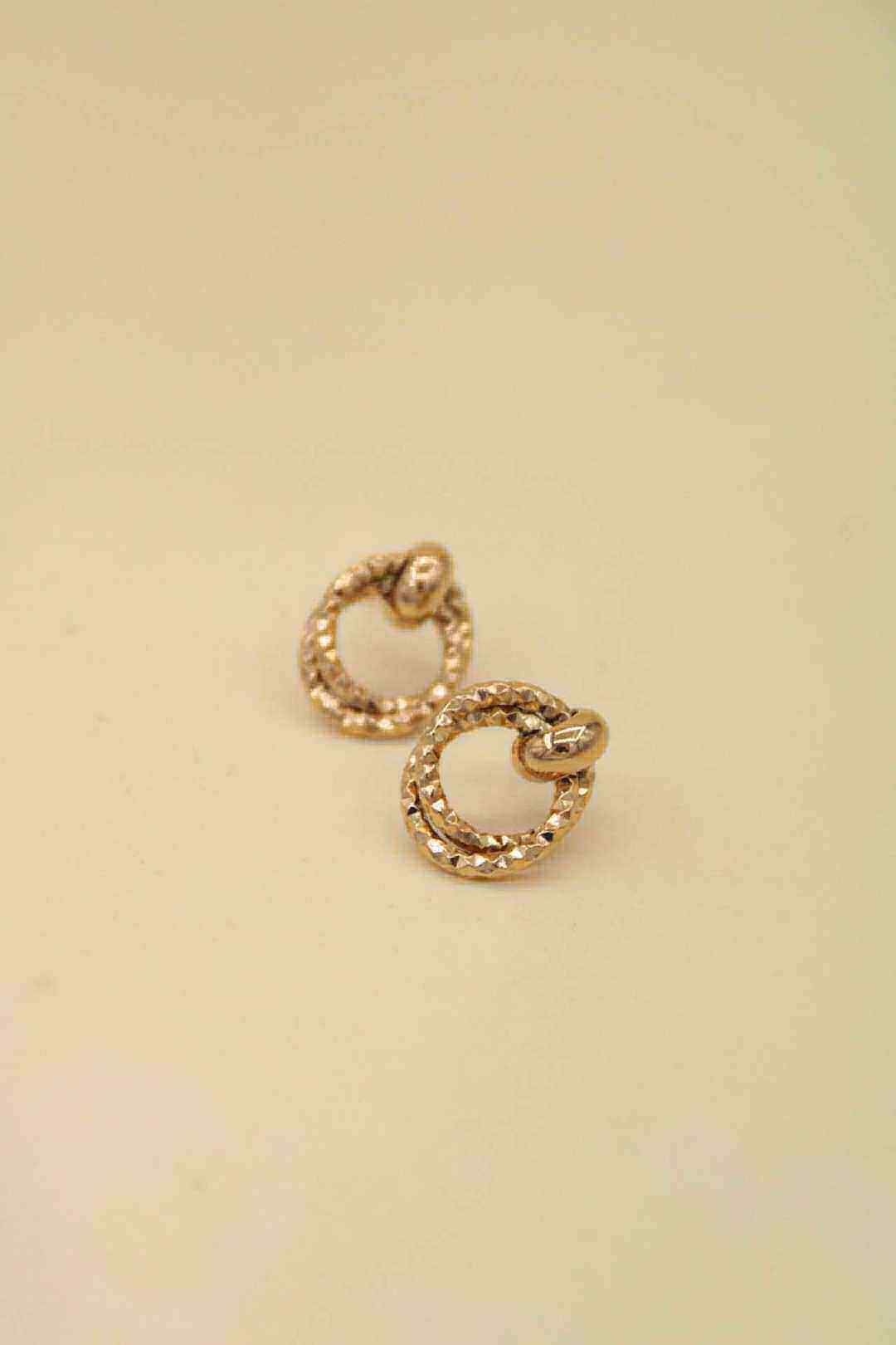 Wholesaler MAISON OKAMI - Stainless steel earrings with a twisted hoop design