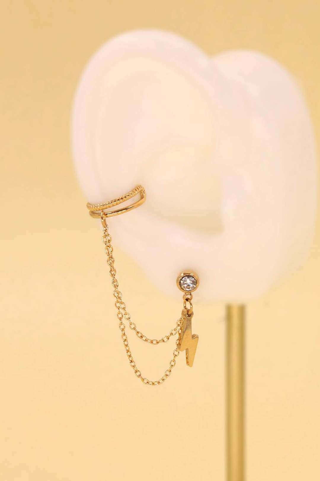 Grossiste MAISON OKAMI - Boucle d'oreille en acier inoxydable avec motif éclaire et chaînette