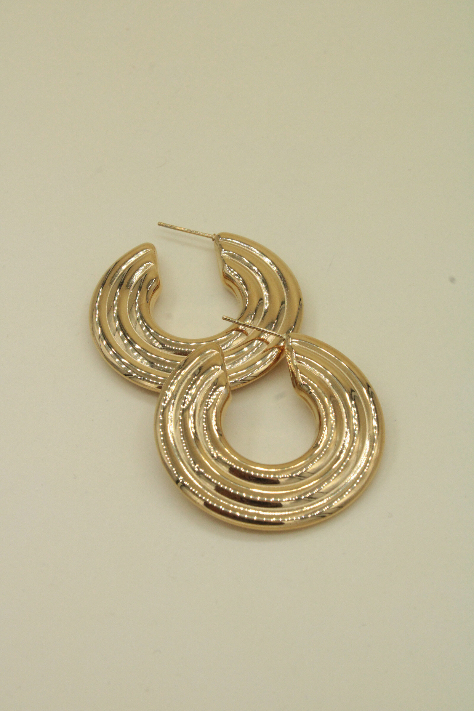 Wholesaler MAISON OKAMI - Stainless steel earrings with spiral patterns