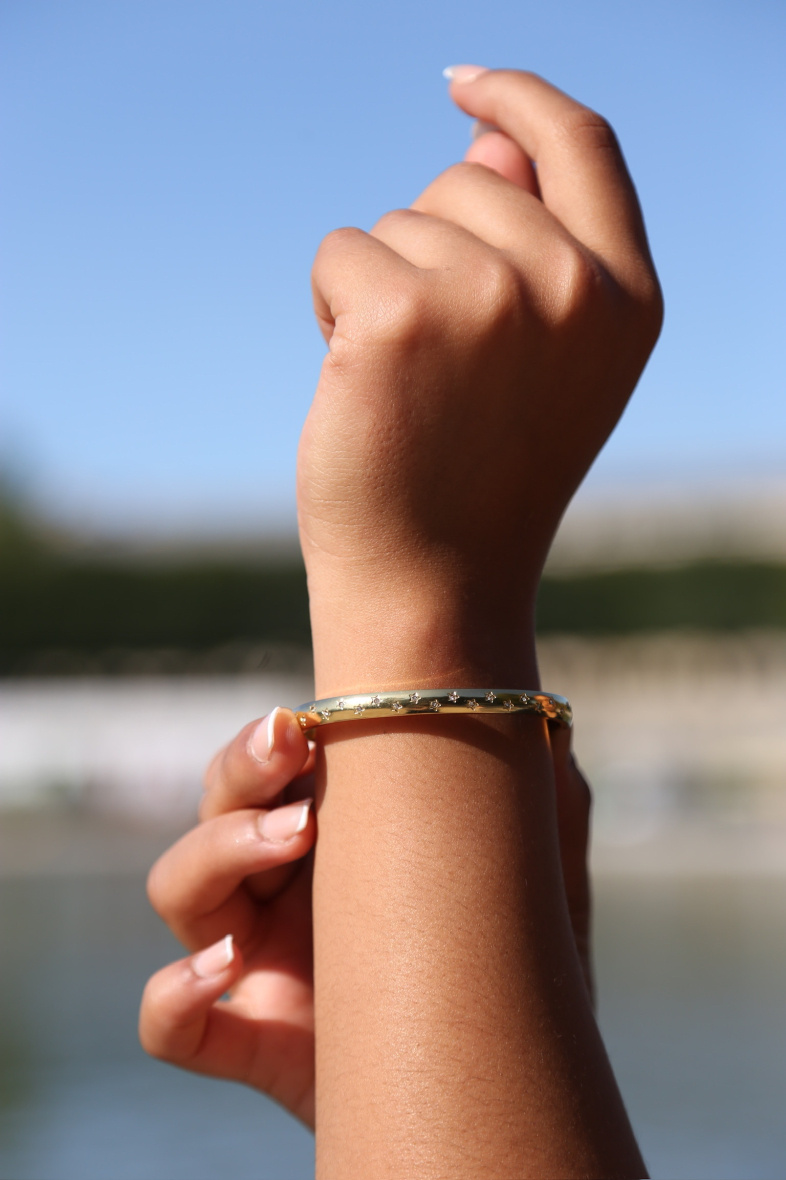 Wholesaler MAISON OKAMI - Starry bangle bracelet in golden brass - Celestial refinement by Maison Okami