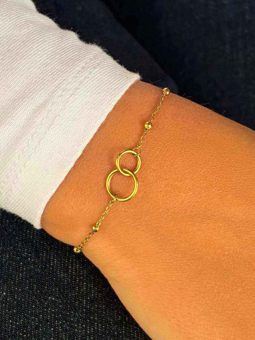 Grossiste MAISON OKAMI - Bracelet élégant en acier inoxydable avec maillons et motif en boucle