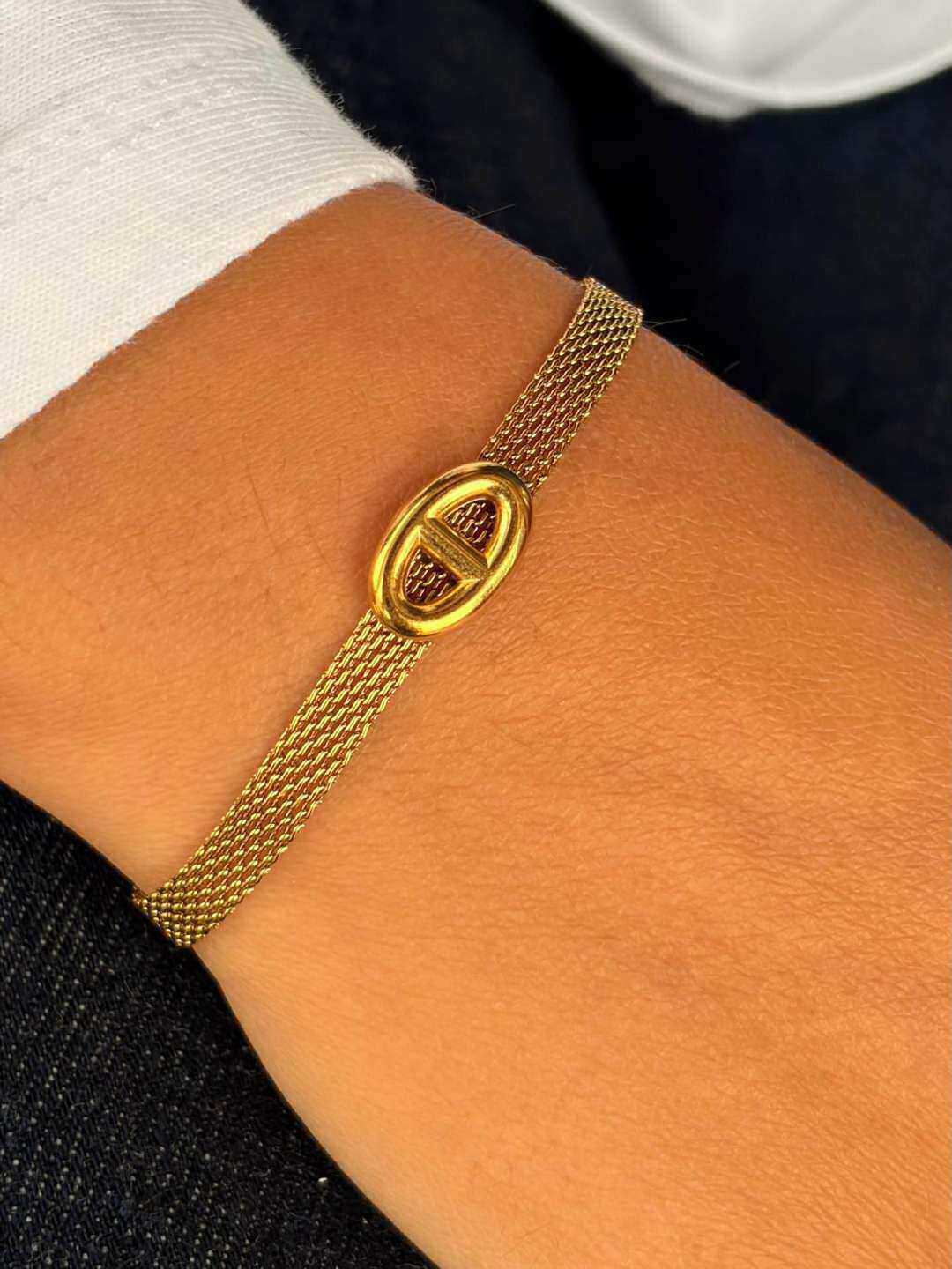 Grossiste MAISON OKAMI - Bracelet en Acier Inoxydable avec Fermoir Oval et Maillons Tissés