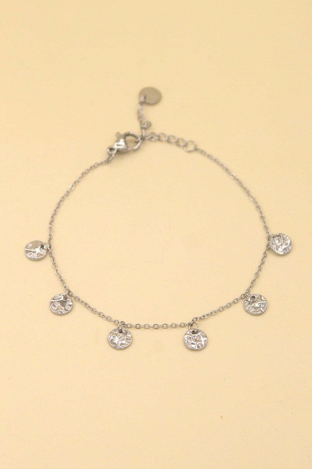 Wholesaler MAISON OKAMI - Delicate stainless steel bracelet with embossed medallions
