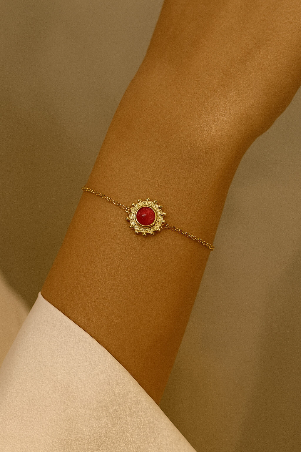 Wholesaler MAISON OKAMI - Gold bracelet with round locket and dark central stone