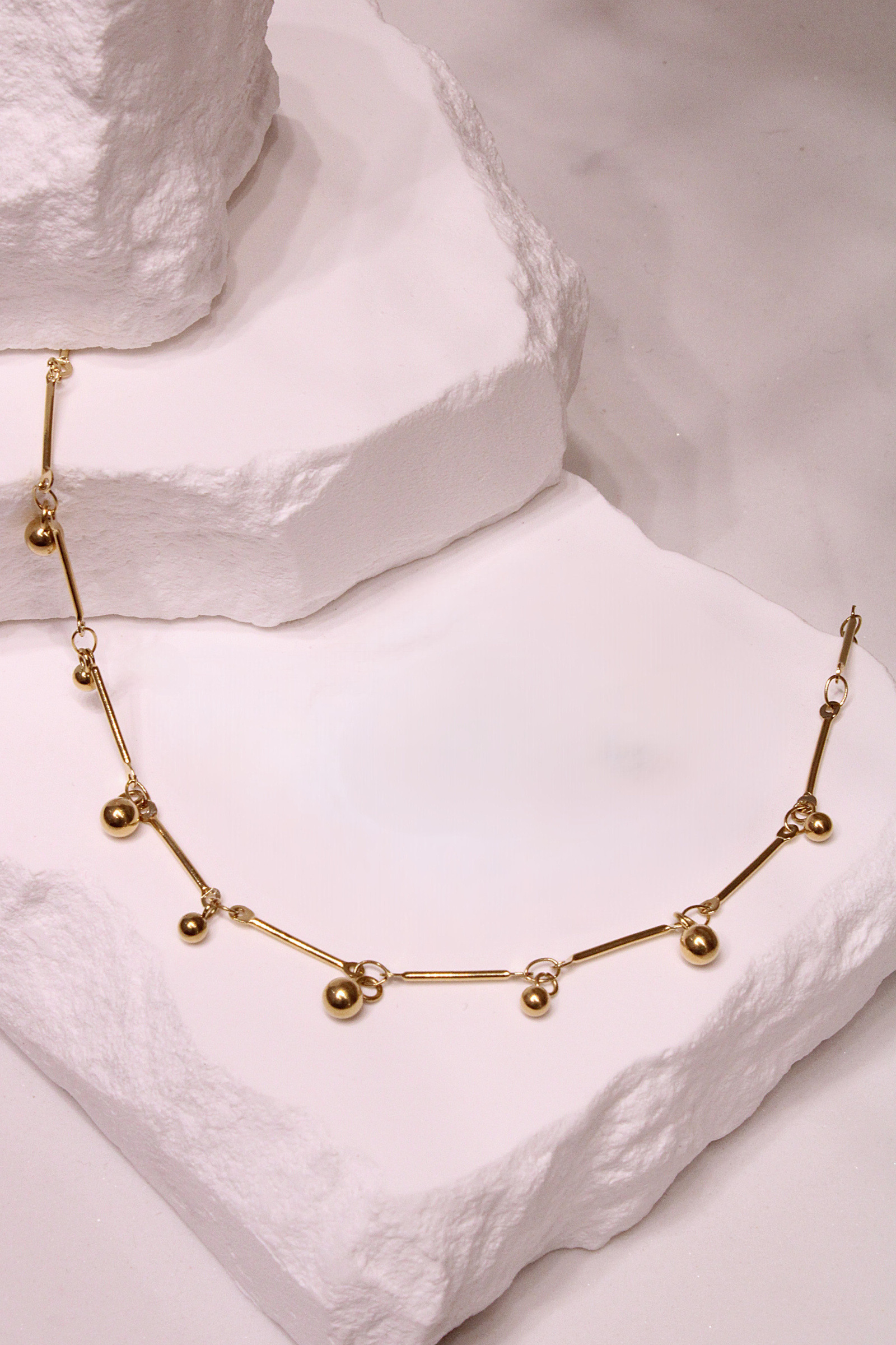 Wholesaler MAISON OKAMI - Golden ankle chain with refined pamples