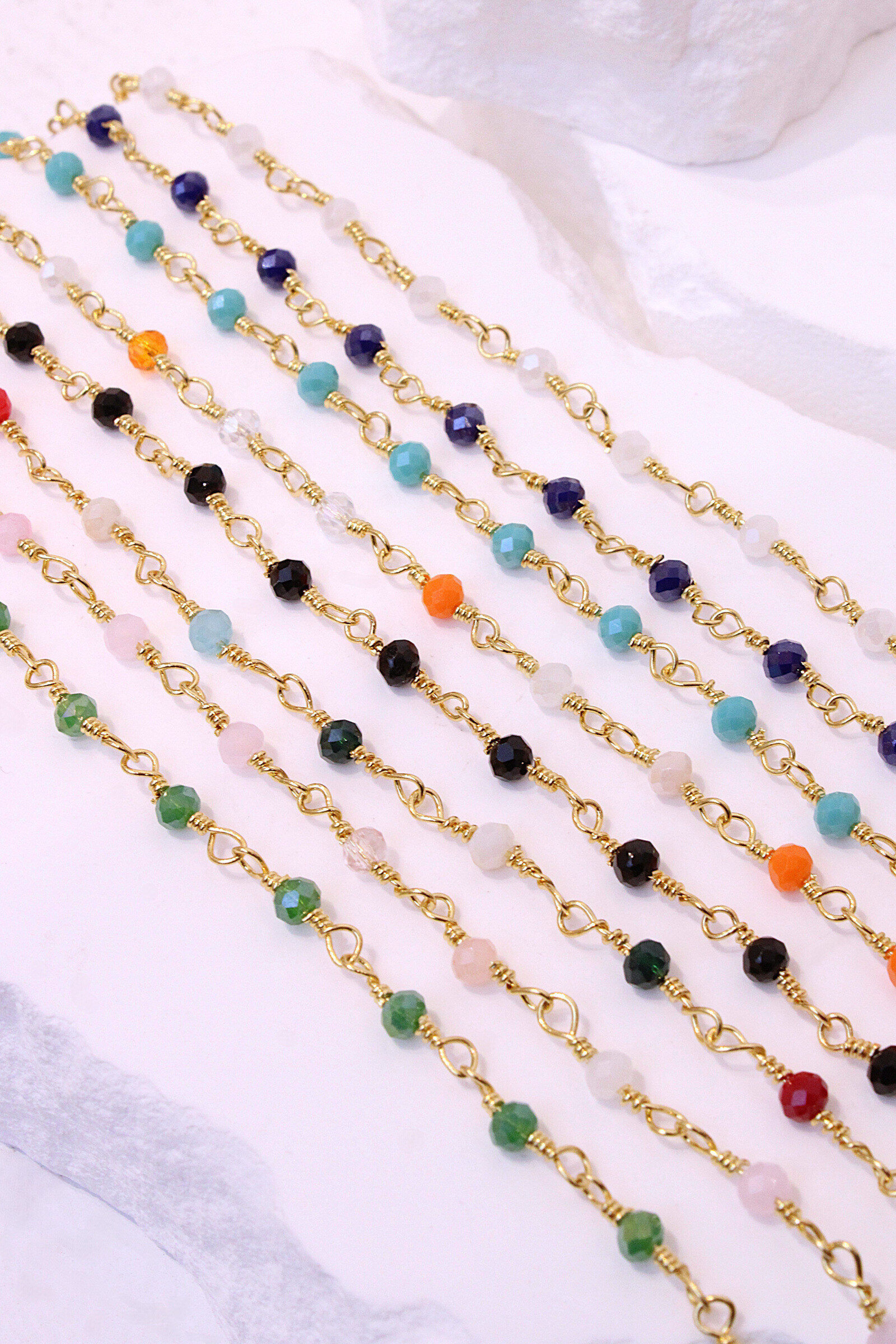 Grossiste MAISON OKAMI - Lot de 8 Chaînes de cheville perles facettées & maillons dorés
