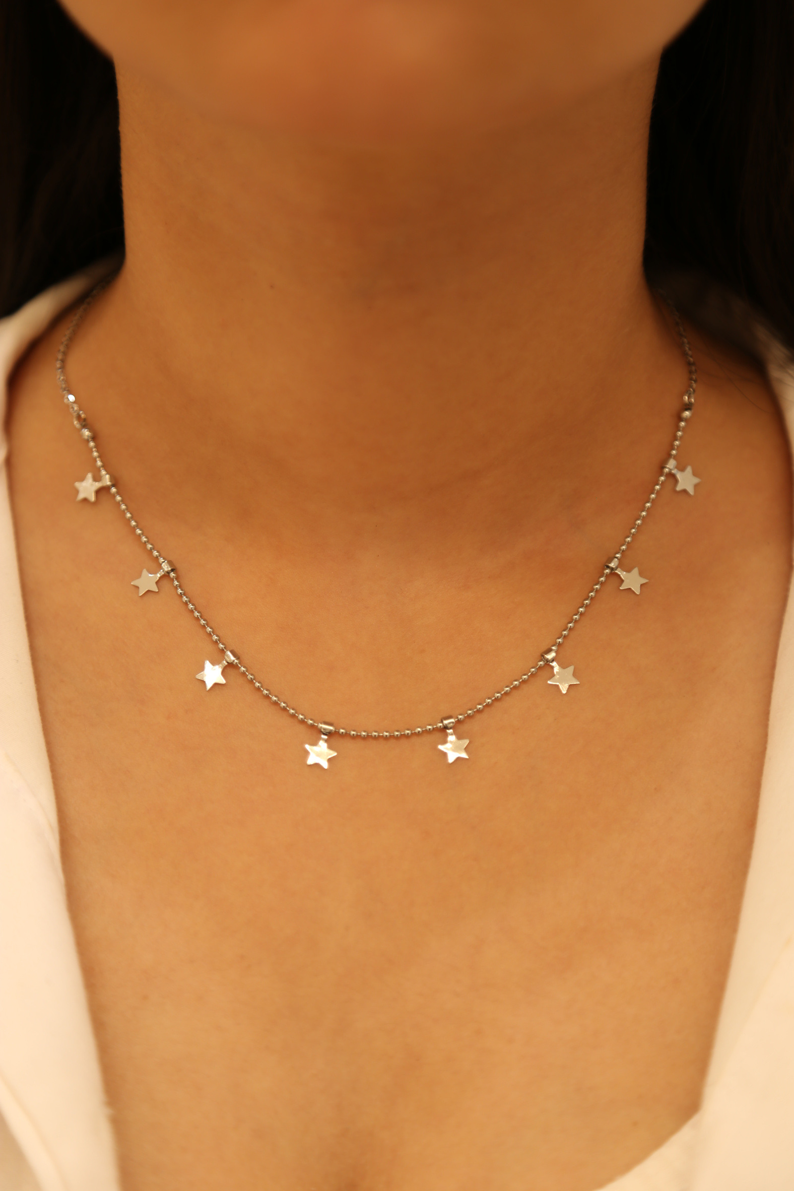 Grossiste MAISON OKAMI - Collier délicat avec pendentifs étoiles