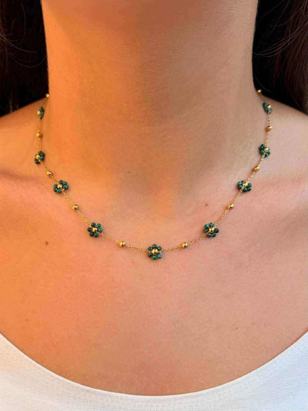 Grossiste MAISON OKAMI - Collier délicat en fleurs avec maillons dorés