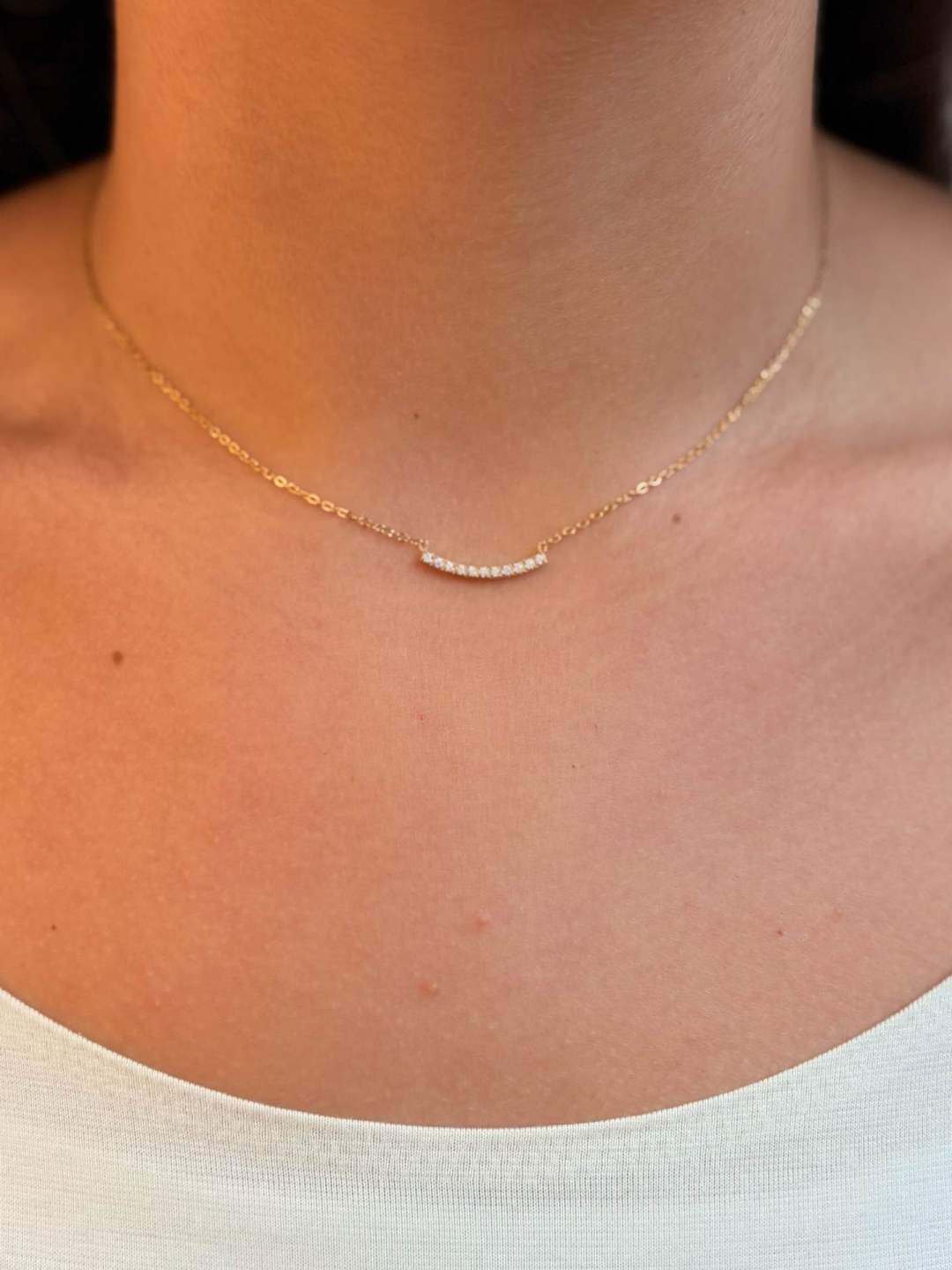 Wholesaler MAISON OKAMI - Delicate necklace with a curved pendant adorned with stones