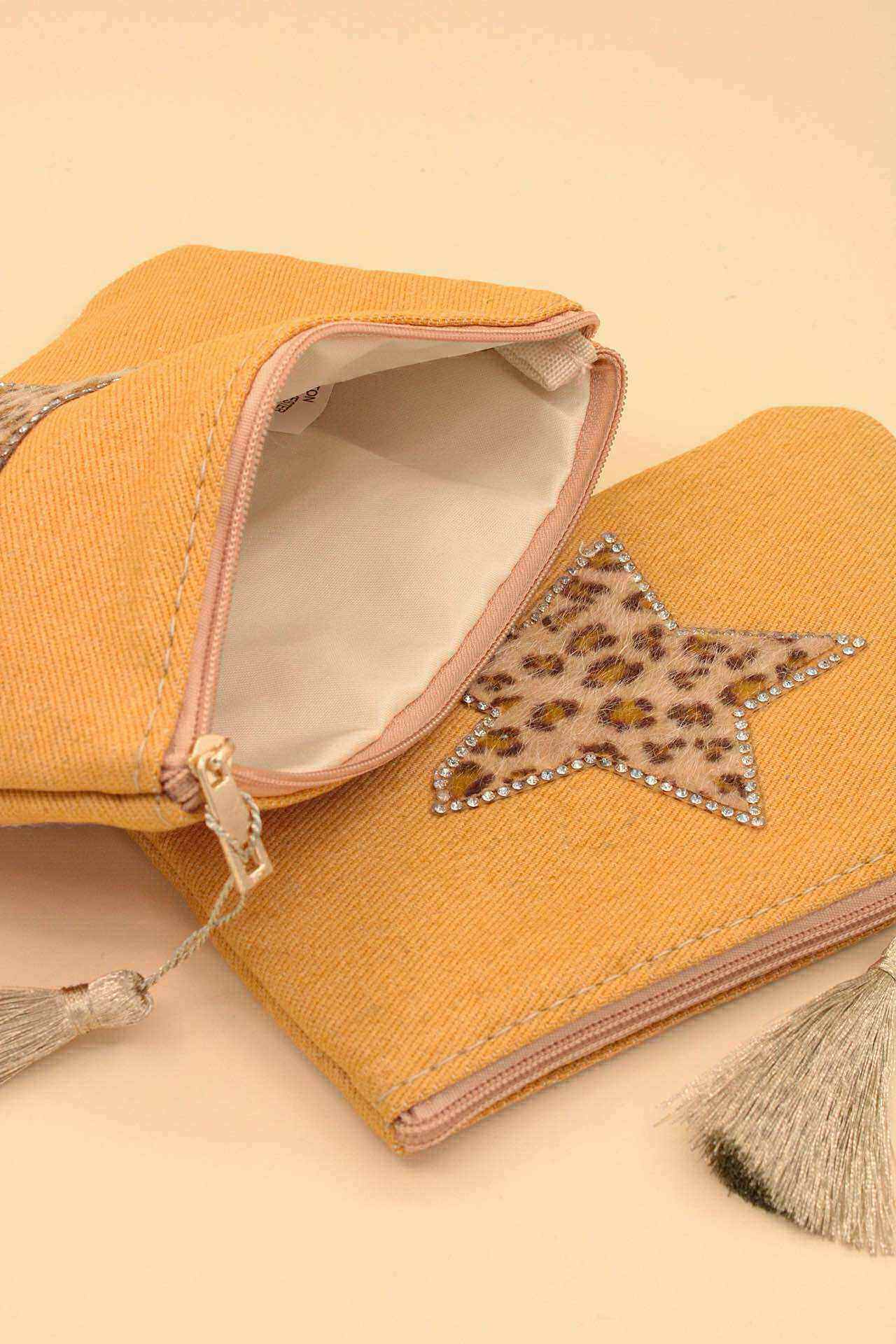 Wholesaler MAISON OKAMI - Trendy clutches with animal prints and sparkling details