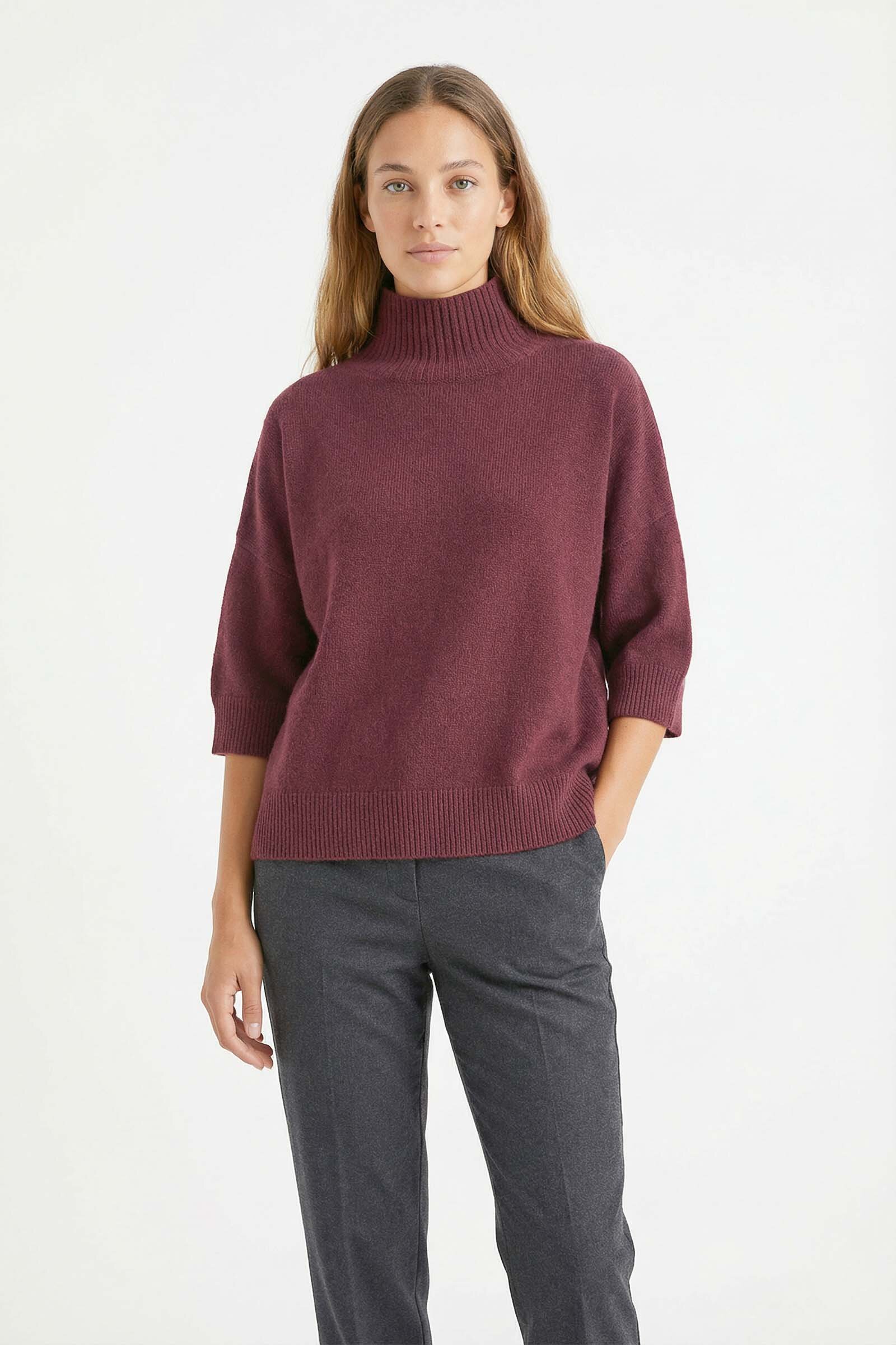 Pull col montant sans couture manches courtes, au toucher cachemire