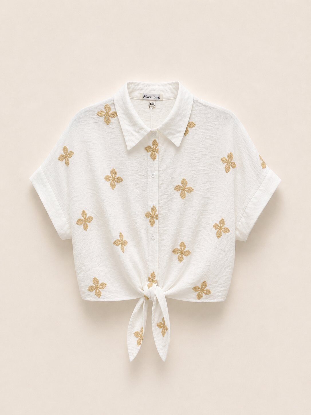 Mayorista max long - Camisa crop con bordados florales y nudo frontal