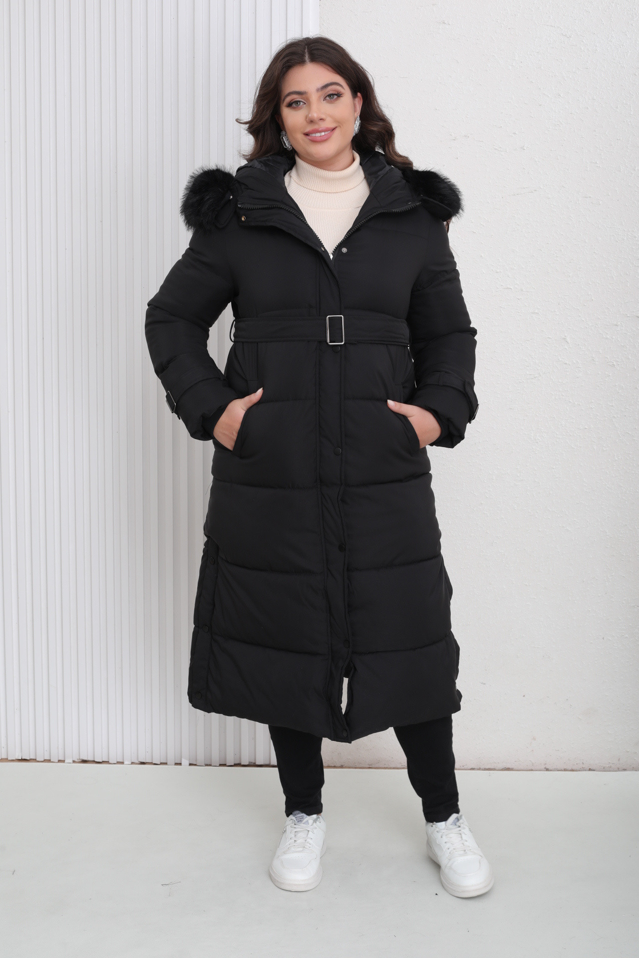 Grossiste Melya Melody - Doudoune longue à ceinture et capuche fourrée En Grande Taille