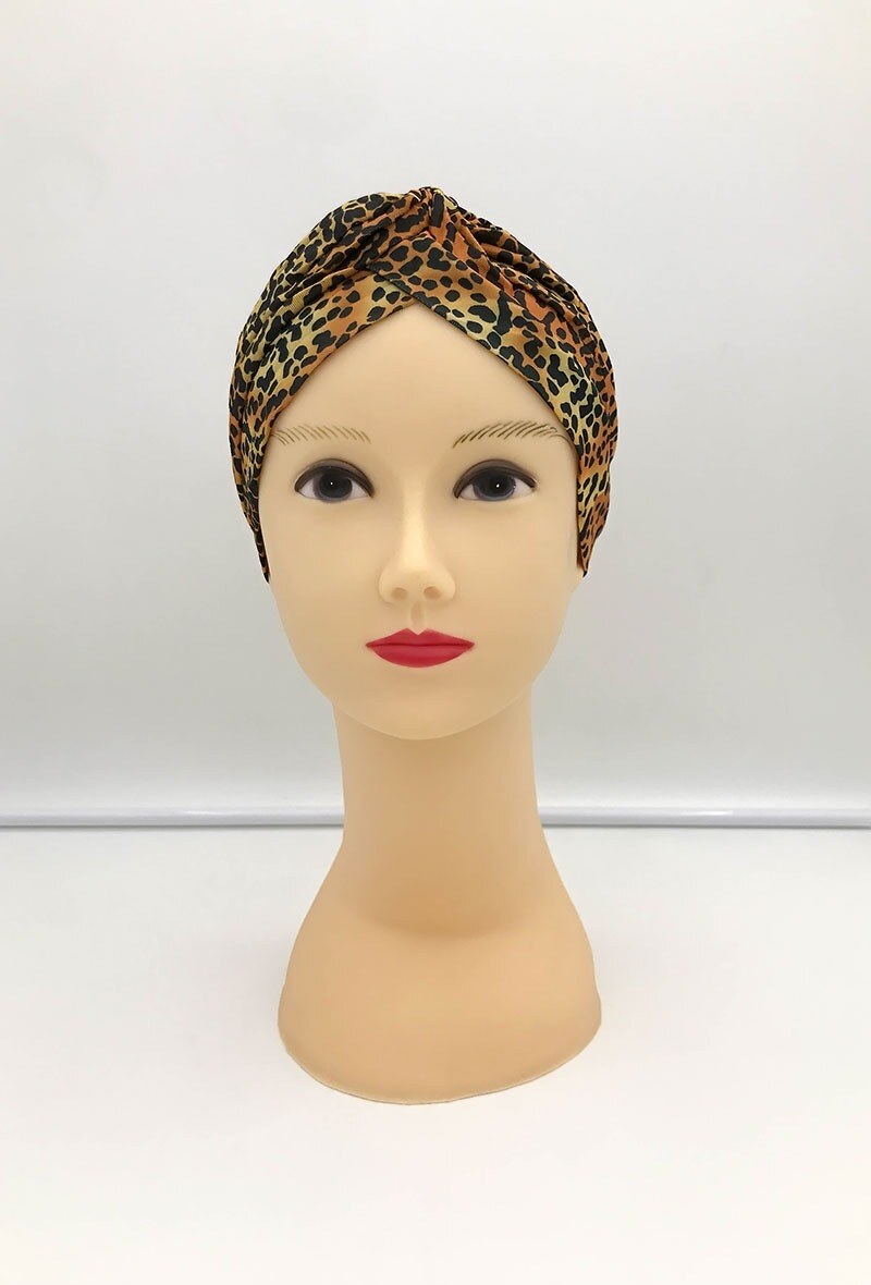 Grossiste MILLE ET UNE ETOILES - Turban femme motif leopard