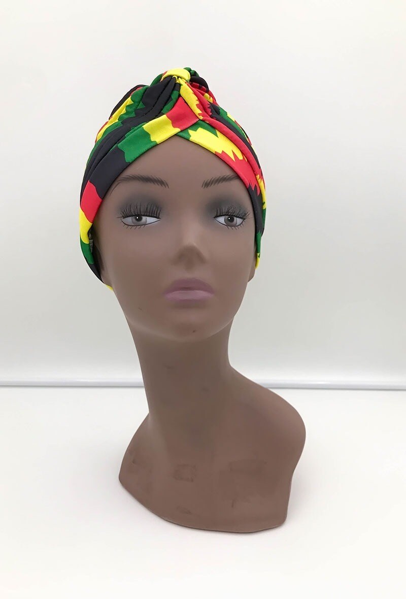 Grossiste MILLE ET UNE ETOILES - Turban femme motif rasta