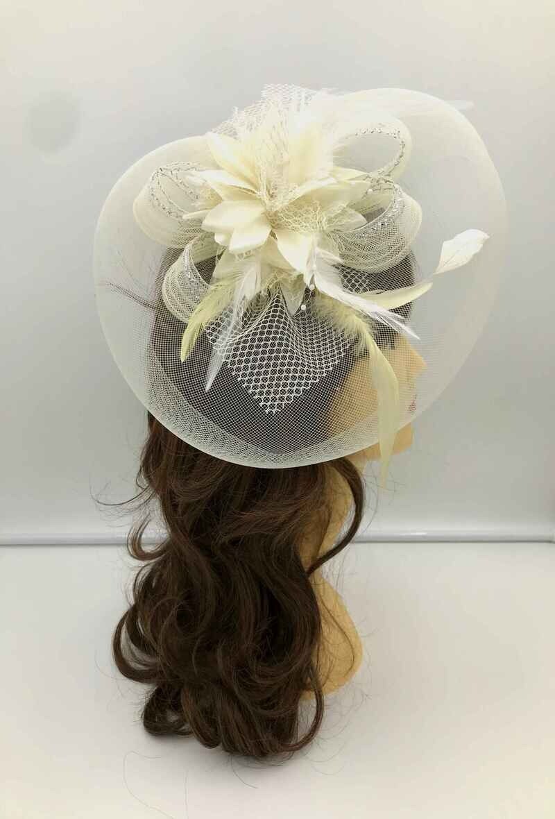 Grossiste MILLE ET UNE ETOILES - Bibi fleur, noeud et plume
